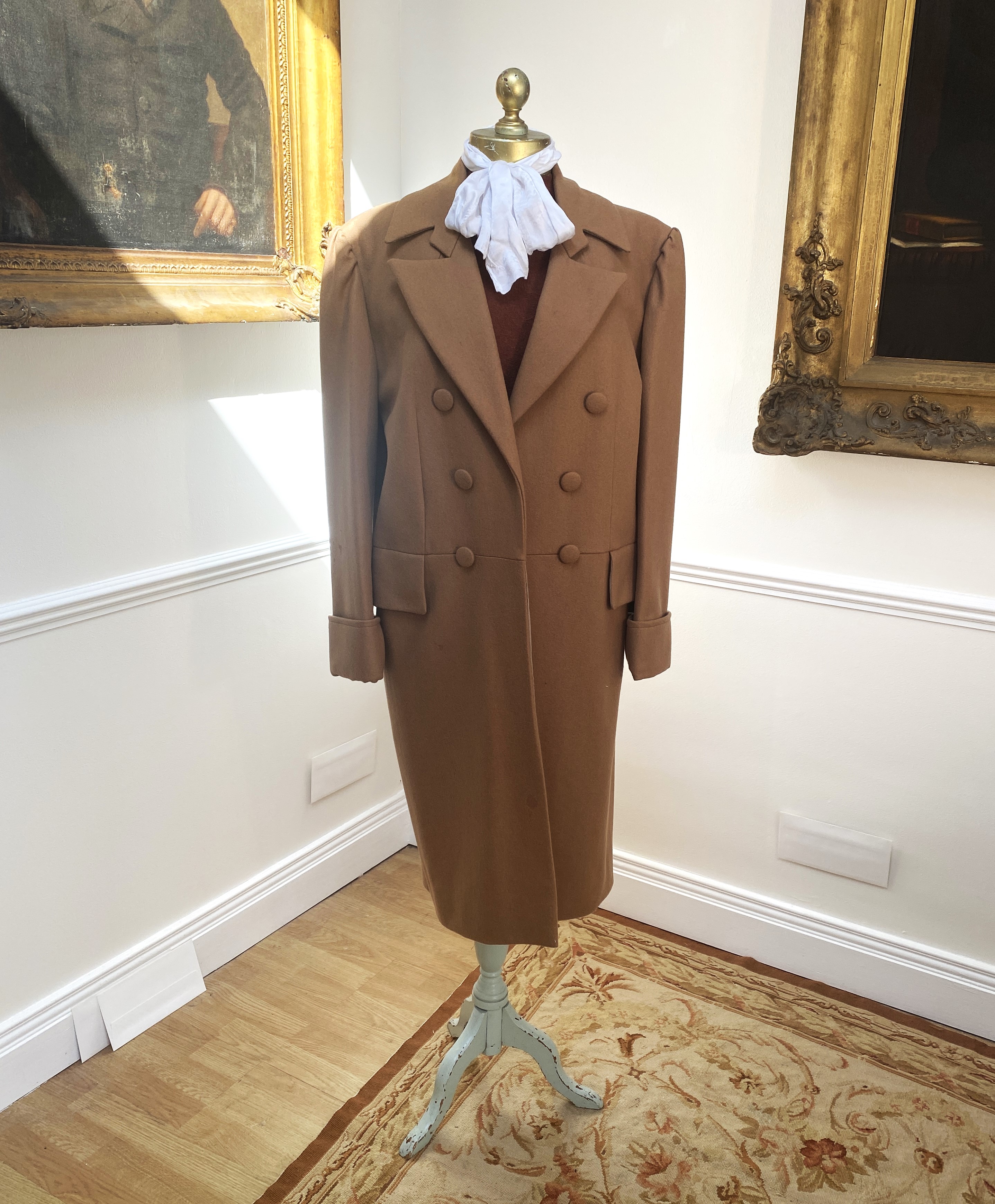 A camel men’s wool frock coat. Size Medium/Large. Condition - slight moth damage